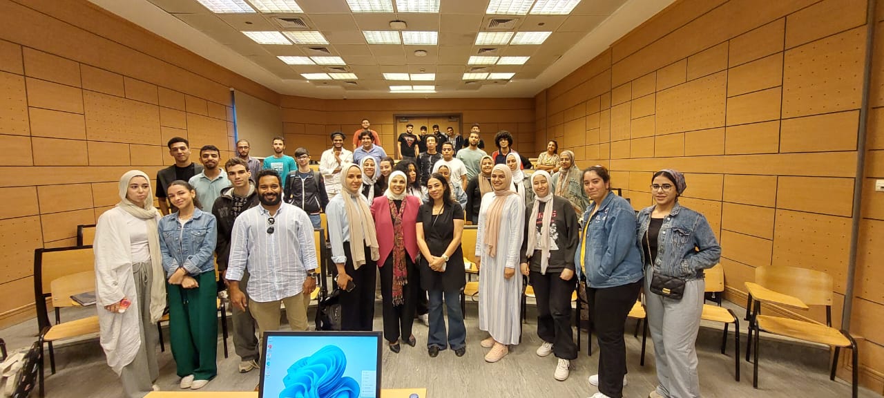 Professor Hassan Aly and Dr Noha Alaa with Nile University Business School students.